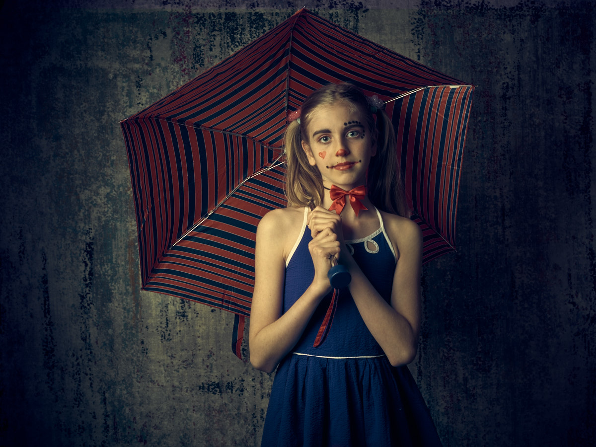 photo of girl with umbrella